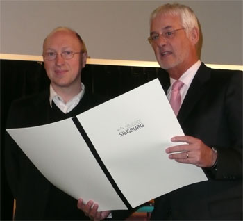 Preisträger Burkhard Spinnen und Bürgermeister Franz Huhn